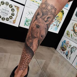 A beautiful black and grey kangaroo with a dotwork geometric design. Tattoo by Kaelin Chee. #dotwork #geometric #blackandgrey #realism #KaelinChee #kangaroo