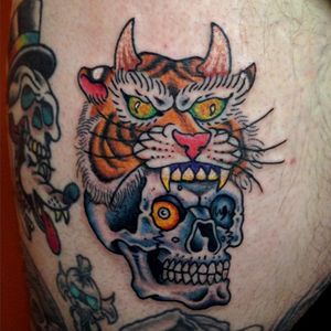Yeah, this skull is wearing a tiger's head for a hat, what of it? (Via IG - mikeattack_tattoo)