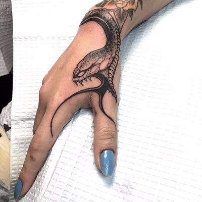 Snake bite by Joao Bosco #JoaoBosco #newschool #newtraditional #snake #scales #fangs #tongue #blackandgrey #reptile #tattoooftheday