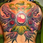 Beautiful texture and technique utilized in this back tattoo done by Erik Campbell. #ErikCampbell #newschool #coloredtattoo #upperbacktattoo #organica