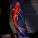 Unusual take on a KOI tattoo done by London Reese. #LondonReese #koi #painterlystyle #coloredtattoo #theartoflondon