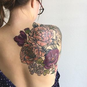 Large floral upper back tattoo by D'Lacie Jeanne. #flower #floral #botanical #D'LacieJeanne #neotraditional