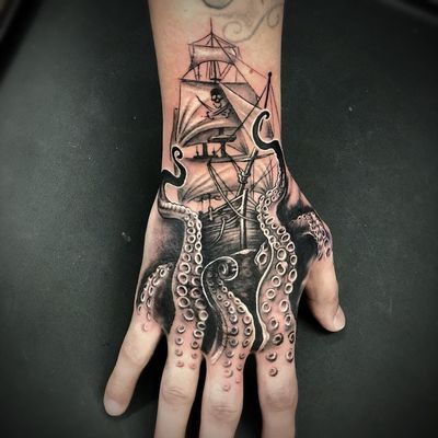 Octopus tattoo by Brittany McCoy #BrittanyMcCoy #octopus #blackandgrey #whiteink #pirate #pirateship #skull #skullandcrossbones #boat #ship #ocean #oceanlife #tentacles #tattoooftheday