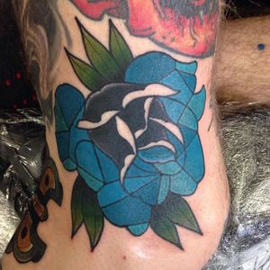Blue and black rose tattoo by Robert Oldfield, photo from Instagram @racotattoo #RobertOldfield #rose #neotraditional #blue #black