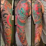 Powerful dragon vs. tiger sleeve tattoo done by Horisuzu. #Horisuzu #Taku #UnbreakableTattoo #JapaneseTattoo #dragon #ryu #tiger #tora #japanese #japanesesleeve #sleeve
