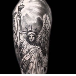 Statue of Liberty with angel wings tattoo by Matt Mrowka. #blackandgrey #realism #wings #angelwings #statueofliberty #newyork #NY #statue #MattMrowka