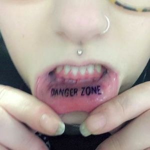 Kenny Loggins would be stoked #liptattoo #dangerzone
