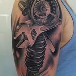 Amazing tattoo composition and very clean work by Massimiliano Fonzo. #massimilianofonzo #blackandgrey #realistic #tools #wrench