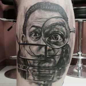 Surreal Salvador Dali portrait tattoo done by Serkan Demirboga. #SerkanDemirboga #surreal #blackandgrey #monochrome #SalvadorDali