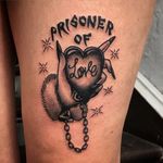 One of Rachie Rhatklor's "prison of love" tattoos with text (IG—rachierhatklor). #heart #prisoneroflove #RachieRhatklor #traditional