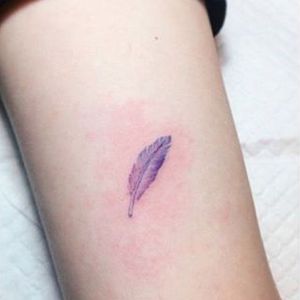 Subtle feather tattoo by Yammy. #subtle #microtattoo #pastel #southkorean #feminine #girly #tiny #feather