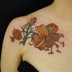 Tiger lilies in different stages of growth. Tattoo by J.Trip. #tigerlily #flower #chest #JTrip