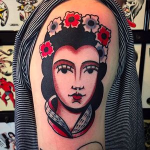 Awesome oriental girl head with some flowers. Tattoo by Jacob N. #JacobN #traditionaltattoo #boldtattoo #oldschool #Girl #traditional