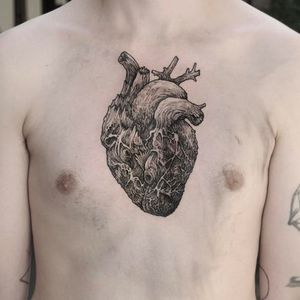 Beautiful tattoo by unknown artist #wooden #heart #linework #chest #anatomicalheart