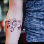 Beautiful flower tattoo done in linework via Instagram @helenxu_tattoo #flower #blackandgrey #botanical #HelenXu #linework #flowers