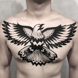 Blackwork eagle chest piece tattoo by Wookssan. #Wookssan #blackwork #chest #eagle #SangwookLee #WookSang