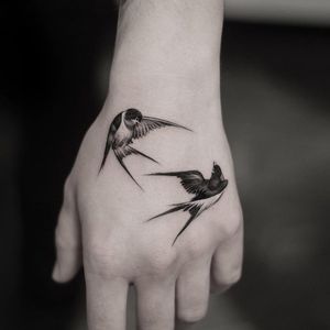 Sweet birds tattoo by Oscar Akermo #oscarakermo #blackandgrey #realism #realistic #illustrative #birds #wings #feathers #sparrows #tattoooftheday