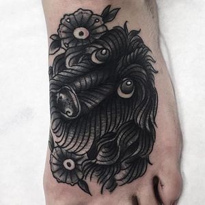 This poodle has got the puppy dog eyes look down pat. Tattoo by Cheyenne Gauthier. #poodle #dog #traditional #blackandgrey #CheyenneGauthier