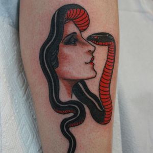 Never show fear. Tattoo by Cris Cleen #CrisCleen #snaketattoos #color #traditional #ladyhead #portrait #snake #reptile #animal