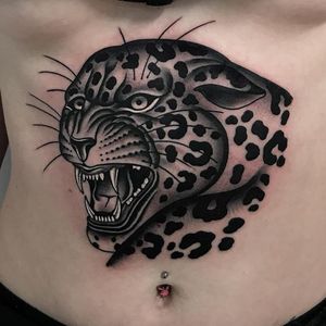Leopard tattoo by Javier Betancourt #javierbetancourt #cattattoos #blackandgrey #whiteink #leopard #junglecat #leopardhead #fangs #roar #print #pattern #spots