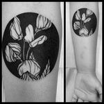Blackwork botanical tattoo by Casper Mugridge. #CasperMugridge #blackwork #flower #negativespace