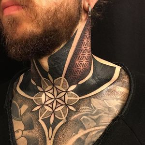 Geometric blackwork neck and chest tattoo by Gerhard Wiesbeck @gerhardwiesbeck #geometric #blackwork #dotwork #mandala #gerhardwiesbeck