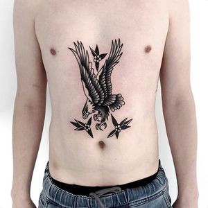 Classic eagle with blossoms. Tattoo by Levi Rivoire. #levirivoire #traditional #blacktattoos #eagle #eagletattoo