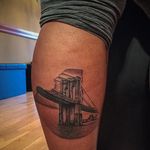 Miniature black and grey Brooklyn Bridge tattoo by Kevin Soomai. #realism #blackandgrey #brooklyn #bridge #brooklynbridge #KevinSoomai