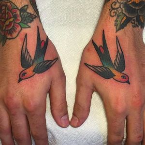 Simple yet beautiful little swallow bird tattoos done by Jason Ochoa. #JasonOchoa #GreenPointTattooCo #traditionaltattoo #boldtattoos #swallow #sparrow