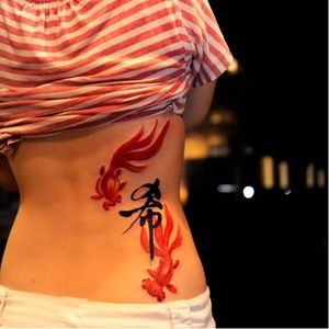 Sumi-e fishes and calligraphy tattoo by Joey Pang #JoeyPang #TattooTemple #calligraphy #fish #sumie #goldfish