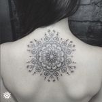 WOW, beautiful mandala tattoo on the back #allantattooer #mandala #detail #fineline #dotwork #flower