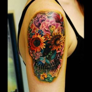 Color realism flower skull tattoo by Justin Buduo. #realism #colorrealism #JustinBuduo #flowers #skull