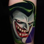 The Joker tattoo by Ben Ochoa. #BenOchoa #colorrealism #popculture #thejoker #joker #dc #villain #cartoon