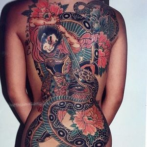 A back-piece by Horiyoshi III from three decades back, which depicts a samurai looked in deadly combat with a monstrous snake. #backpiece #destigmatization #Horiyoshi #Japanese #legendary #master #snake #traditional