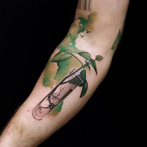 Testtube Tattoo by Fabbe Persegani #Watercolor #WatercolorTattoo #BrushStrokeTattoo #ContemporaryTattoos #FabbePersegani #testtube #green #leafes #contemporary
