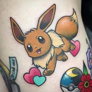 Eeevee tattoo by Carly Baggins. #CarlyBaggins #pokemon #eevee #cute #critter #anime #videogames #kawaii