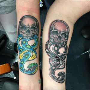 A pair of Dark Mark tattoos.