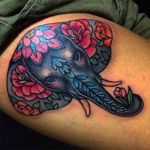Clean and beautiful elephant head adorned with flowers. Awesome tattoo work by Toxic Jan Fresco. #toxic #JanFresco #goodhandtattoo #neotraditional #coloredtattoo #elephant #animaltattoo #elephanthead #flowers