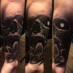 Insane looking skull and flower by Brandon Herrera. #brandonherrera #darktattoos #skull #blackwork #btattooing #blackrose #blackskull