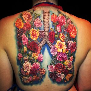 A touching memorial tattoo for a loved one by Jamie Schene. (Via IG - jamie_schene) #JamieSchene #colorrealism #roses