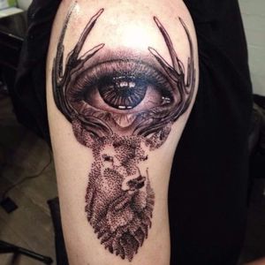 The juxtaposition of the two styles together realism and dotwork make this an unusual piece Photo from Luc Suter on Instagram #LucSuter #BlackDiamondTattoo #LosAngeles #blackworker #fineline #realistic #deer #eye #dotwor