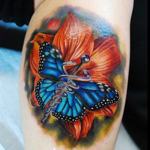 A realistic butterfly with a caduceus for a body by Justin Buduo (IG—artofbuduo). #butterfly #caduceus #color #JustinBuduo #realism #TheStaffofHermes