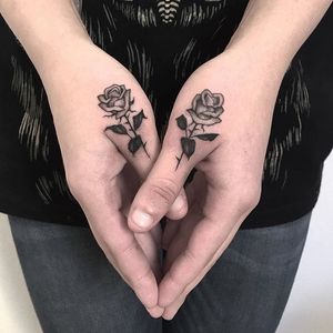 Itty bitty roses on thumbs, by Adam Vu Noir (via IG—adamvunoir) #microtattoo #smalltattoo #tinytattoo #TattooRoundUp