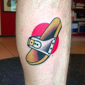 Cleanly done left slipper tattoo by Luca Sala. #LucaSala #OldInkTattoo #boldtattoos #solidtattoos #slippers