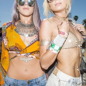 Trendy babes flashing ink at the festival, photo by Shane Lopes for LA Weekly #coachella #festival #tattoostyle #fashion #flashtattoo #temporarytattoo