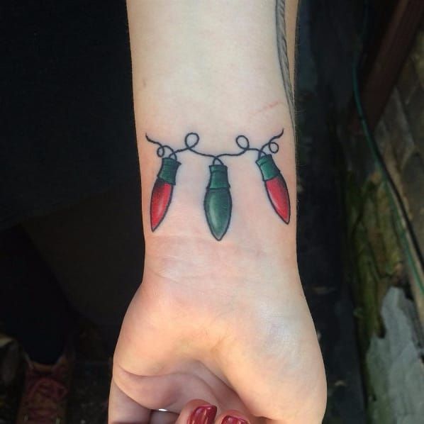57 Lovely And Glorious Festive Christmas Lights Tattoos Ideas And Designs   Psycho Tats