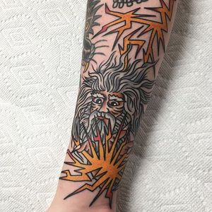 Zeus raining down some thunderous wrath by Mikey Holmes (IG—mikeyholmestattooing). #bold #colorful #American #lightning #MikeyHolmes #traditional #Zeus