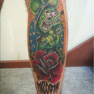 A Rat Fink done up like the Virgin Mary by Angela Bailey (IG—apbailey_tattoos). #AngelaBailey #EdRoth #RatFink #rose #traditional