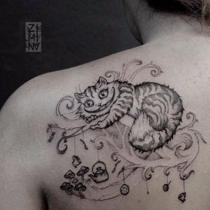 Cheshire cat tattoo by Zhenya Zimina #ZhenyaZimina #blackwork #engraving #cat #cheshirecat #aliceinewonderland #btattooing #blckwrk