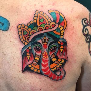 Tattoo by Robert Ryan #RobertRyan #color #traditional #Hindu #surreal #Ganesha #flower #floral #leaves #nature #symbolism #trident #crown #pearls #tusks #elephant